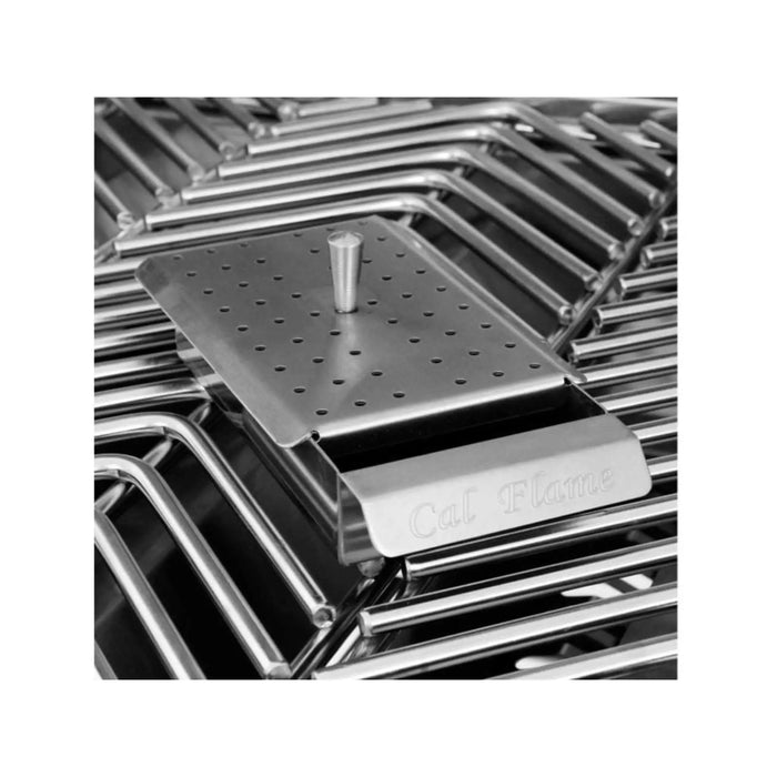Metal grill grate with a perforated plate on a white background